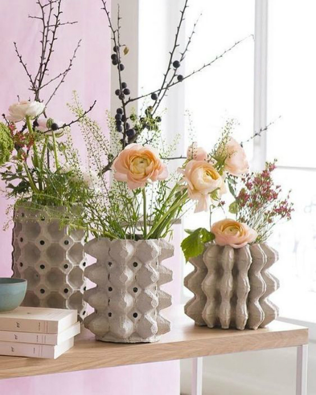 Vasos de planta de caixa de ovo