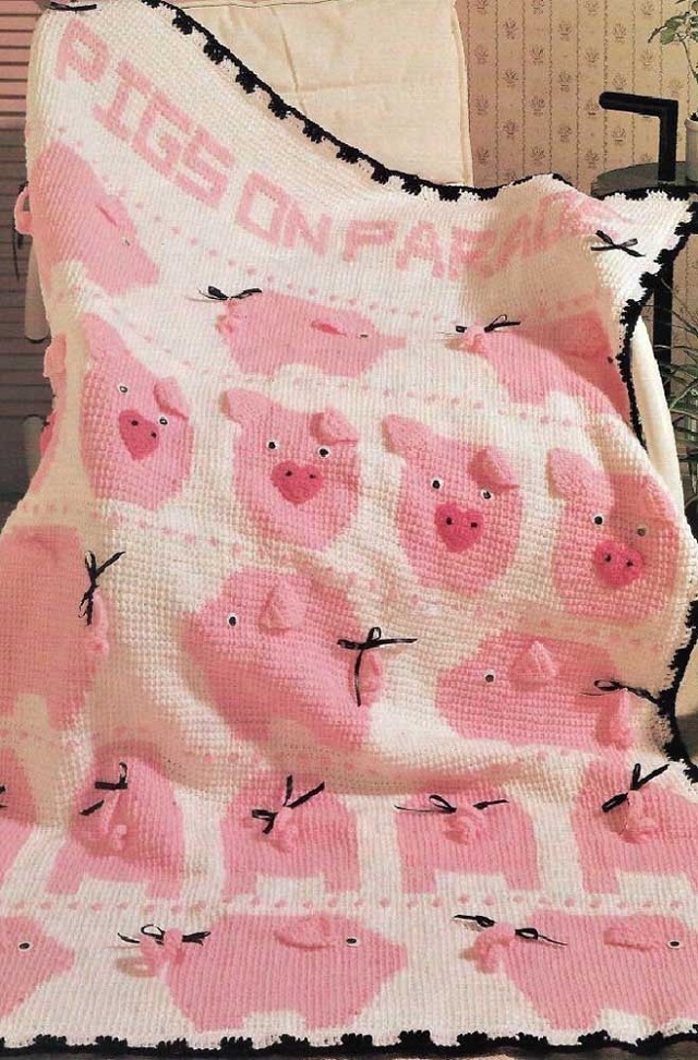 Manta com desenhos de porquinhos de crochê tunisiano 